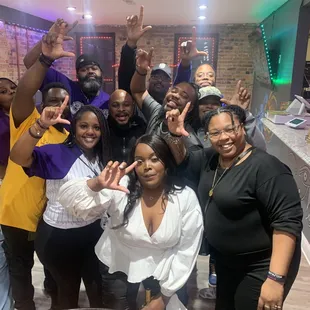 a group of people posing for a picture