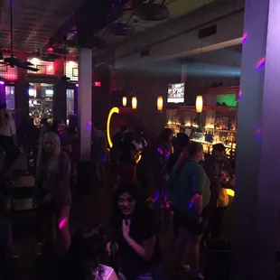a crowd of people at a nightclub