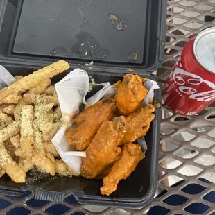 Buffalo Wings, Garlic Fries and a Coke