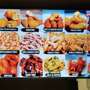 Photos on the menu board of some of their food. Wings, fries, sides