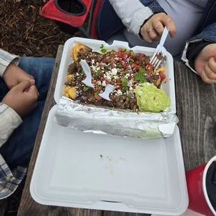Papi Fries with carne asada!  Super bomb! And DONT FORGET TO ASK FOR THE GREEN SALSA!!!! ITS AMAZING!!
