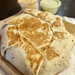 Breakfast crunch wrap - has some heft to it! Love the mild and medium sauces too