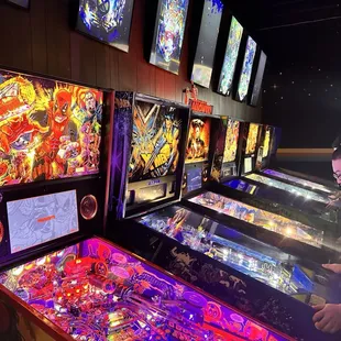 a row of pinball machines