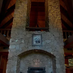35ft Granite fireplace and redwood vaulted ceilings give the Little Ahwahnee Inn "Rustic Elegance".