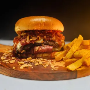 Texas Burger Special: A giant double-patty monster layered with turkey bacon, BBQ sauce, beef fat-infused ranch, and crispy onion