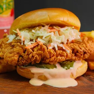 Angelic Chicken Delight: fried chicken breast, pickle slices, coleslaw, and Angel's Secret sauce