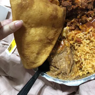 Carne adovada, beans, rice, and a sopaopilla