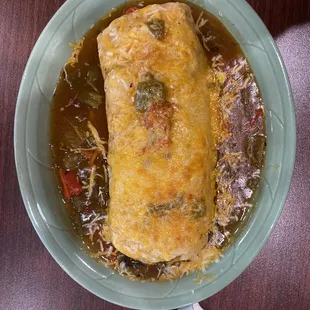 Green chile smothered burrito grande (breakfast burrito)