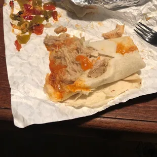 This is supposed to be a #26 Chicken burrito ordered with red chili only and a not soggy, not ripped tortilla.