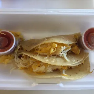 Their breakfast tacos are delicious! Corn tortilla, eggs, bacon, hash browns, and cheese