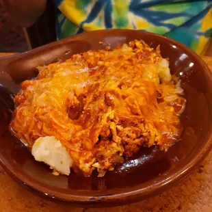 Huevos con Chorizo.  The chorizo was not greasy BUT the meal was served over potato chunks.