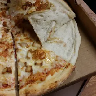 Fake thick crust pizza falling apart.