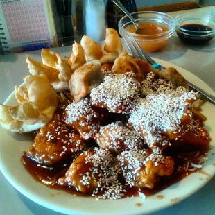 amazing seseme chicken with crab rangoon and mini ravioli