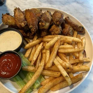 Lemon pepper wings and fries! The flavor on these dry lemon pepper wings were fantastic