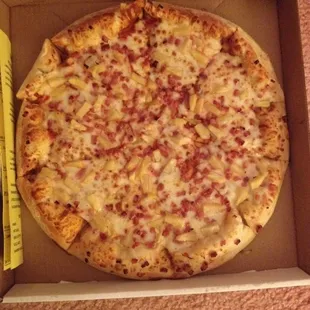 Ham and pineapple pizza (they don't have Canadian bacon)