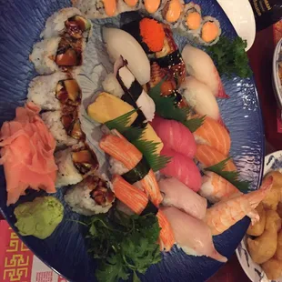 Sushi for two with eel avocado and spicy salmon rolls for the pick two