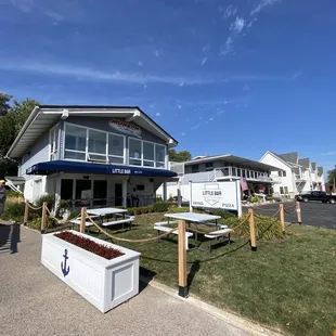 a man standing in front of a building