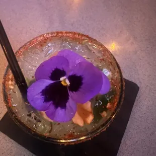 I come for the vibe and the deliciously spicy Mezcal margarita that Rojia makes hits the spot every time!