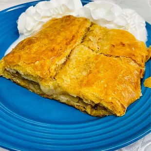 Apple strudel with whipped cream