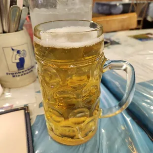 a mug of beer on a table