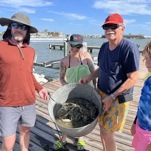Grandpa showed the family had to catch some crabs...... and now he says he&apos;s going to go show them how to cook them!