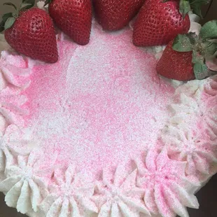 a strawberry cake in a box