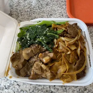 a take out container of food