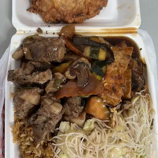 a meal in a styrofoam container