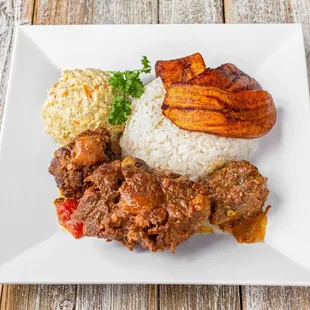 a plate of meat and rice