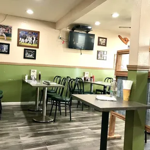 tables, chairs, and refrigerator