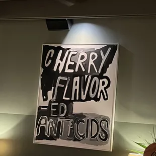a sign that says cherry flavor
