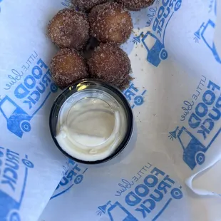 sugar coated doughnuts in a bowl