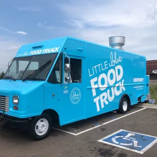 a food truck parked in a parking lot