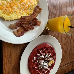 Red velvet waffles with caramelized pecans and honey. Meat &amp; Eggs and FRESH squeezed OJ.