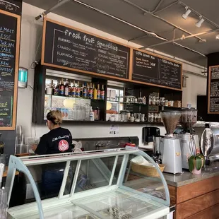 a woman behind the counter