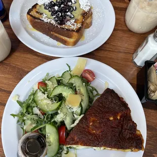 Mascarpone - Stuffed French Toast w Strawberry Arugula Salad and Quiche of the Day paired with Vanilla Iced Latte