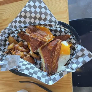 Bacon, egg croissant with hash browns