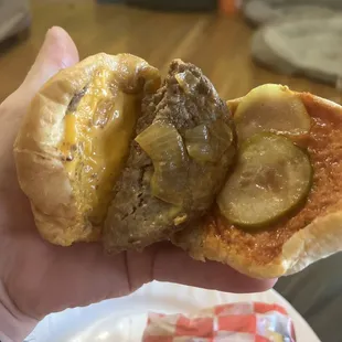 Cheese burger with ketchup, mustard and onion. Good stuff