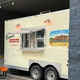 a food truck parked in front of a building