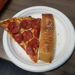 A slice and a piece of stuffed crazybread