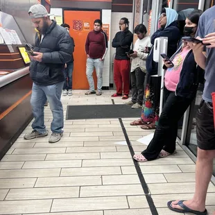 We've been standing here for 46 minutes while coworkers are in the back laughing