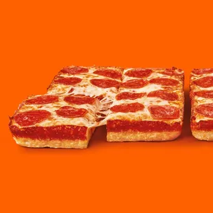 a slice of pepperoni pizza