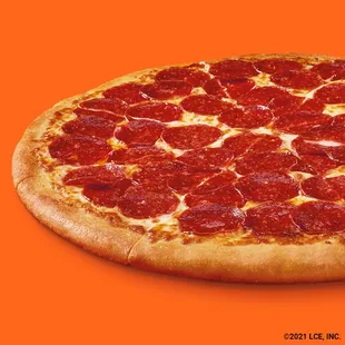 a pepperoni pizza on an orange background