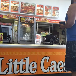 a man standing in front of the counter