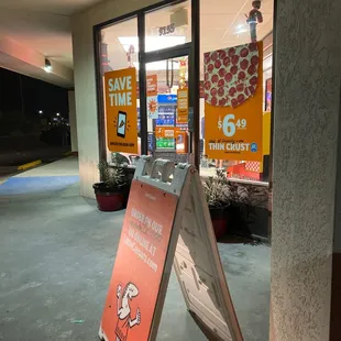 a sign in front of a store