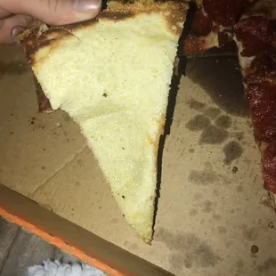 a slice taken out of a pizza