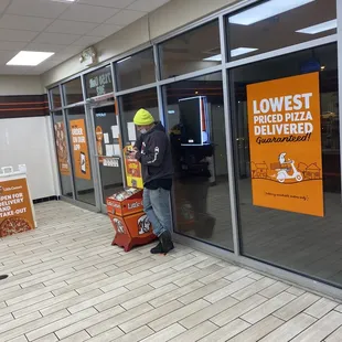 Employee and a customer in the Leetsdale and Quebec Little Caesar's with their masks hanging below their noses (WHICH IS POINTLESS!!!)