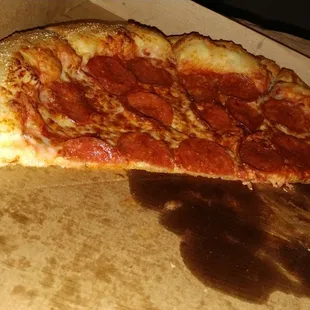 a slice of pepperoni pizza