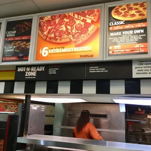 a woman ordering pizza