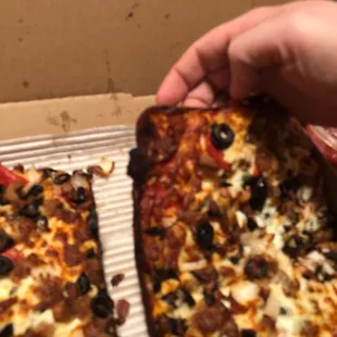 Potato chip crust burnt toppings were dry and hard to eat tasted burnt as well really